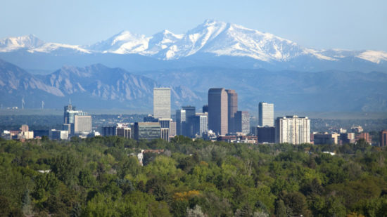 Denver Colorado skyscrapers snowy Longs Peak Rocky Mountains summer